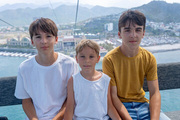 Family with children, visiting Vinpearl, island near Nha Trang, connected with a cable car,...