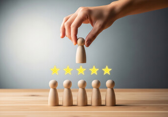 Leadership and Excellence: A hand carefully selects a wooden figure from a lineup, placing it above a row of glowing stars, signifying exceptional leadership and outstanding performance. 