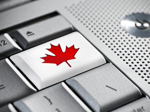 Canada maple leaf symbol on computer keyboard button