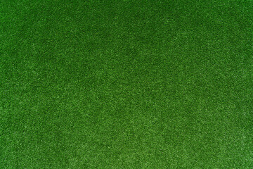 perfect green artificial grass on the soccer stadium texture - well-groomed turf in the stadium