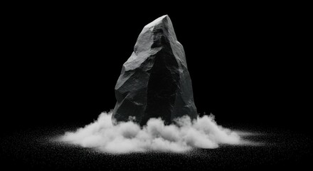Dramatic stone rock formation with fog on black background