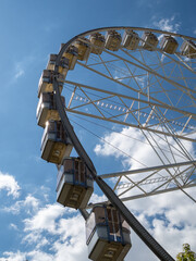 ferris wheel against blue sky