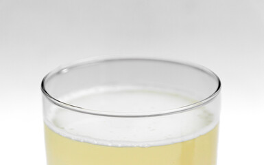 Closeup photograph from dissolved liquid collagen in a glass. Version 2.