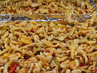 close up of a pile of sour and spciy chicken feet in the installment for sale