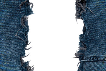 Piece of black torn denim on a white background. Denim texture