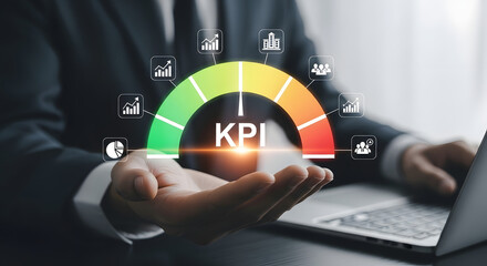 Business professional displaying kpi performance indicator with digital icons