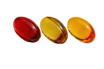 Three translucent capsules, red, amber, and yellow, arranged horizontally against a transparent background