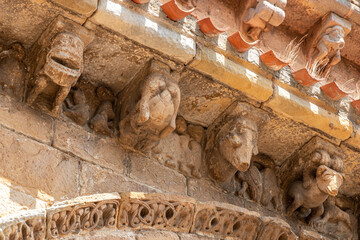 Cervatos, Spain. Romanesque corbels of San Pedro with grotesque monsters and erotic motifs on the...