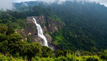 Waterfall cascading down rocky mountainside (1)