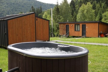Tub with hot water at luxury resort in mountains