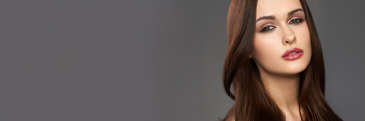 Elegant Portrait of Woman on Gray Wide Banner with Copy Space