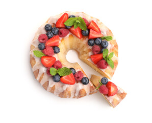 Delicious bundt cake with berries, glaze and mint isolated on white, top view
