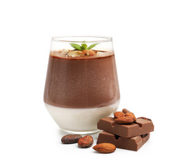 Delicious panna cotta with almonds, cocoa beans and chocolate pieces isolated on white