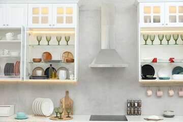 Different dishware, glasses and other kitchen utensils indoors