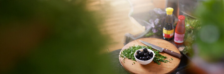 Wide Banner of Herbs and Olives with Copy Space