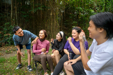 Indonesian southeast asian people in a sporty outfit conversation or discussion together after...