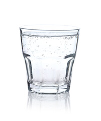 Refreshing soda water in glass isolated on white
