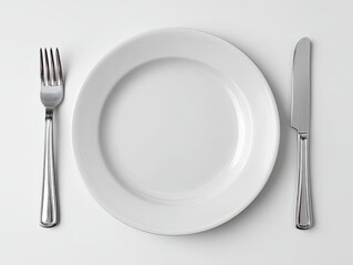 Empty white plate with fork and knife on white background