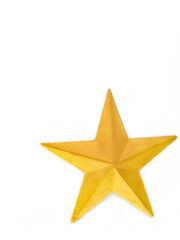 Obraz premium A gold star on a white background. Handcraft ornament of a gold glitter painted star made from Styrofoam. Handmade gold glitter painted star for decoration. Space for text.