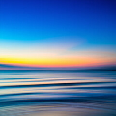 Fototapeta premium A vibrant abstract image of a serene sunset over a placid ocean.