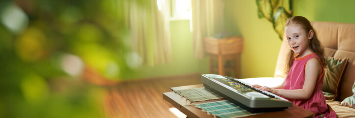 Child Playing Keyboard in Cozy Room Wide Banner with Copy Space