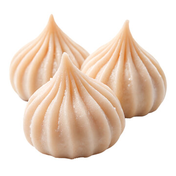 Close-up of Traditional Indian Modak Sweets with Coconut and Jaggery Filling, Popular Festival Dessert for Ganesh Chaturthi Celebration isolated on white

