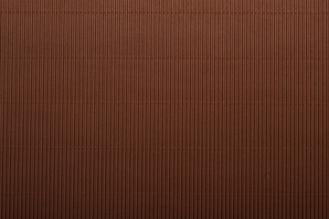 A vibrant brown corrugated surface with a ribbed texture, perfect for use as an abstract background.
