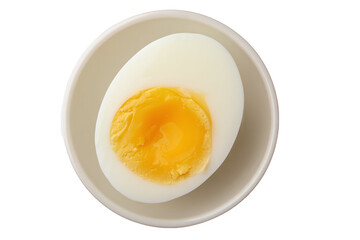 Soft-boiled egg half on plate, top view, isolated on white transparent background
