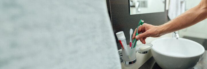 Bathroom Scene with Toothbrushes Wide Banner