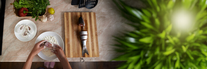 Food Preparation Scene with Fish and Ingredients Wide Banner