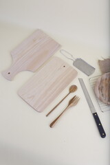 Wooden Kitchen Utensils on Beige Surface
