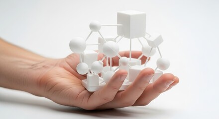 Human hand gently supporting an intricate 3D-printed model symbolizing network connections and data technology