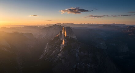 Majestic Sunrise Over Yosemite's Towering Granite Cliffs and Breathtaking Mountain Ranges