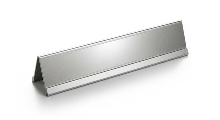 Fototapeta premium A sleek, professional metallic desk nameplate, ready for personalization, presented cleanly on a pristine white background. Ideal for office branding and recognition