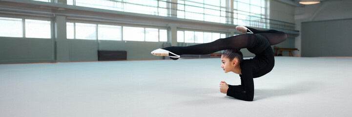 Gymnast in Flexibility Pose Wide Banner with Copy Space