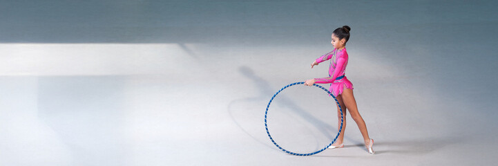 Rhythmic Gymnast with Hoop on Wide Banner with Copy Space