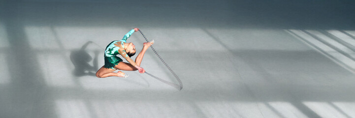 Rhythmic Gymnast Performing Jump Wide Banner