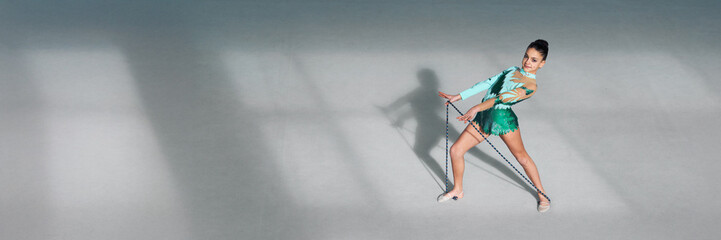 Rhythmic Gymnast Posing with Ribbon on Wide Banner