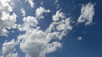 Cumulus clouds resemble cotton wool or cauliflower, usually flat on the bottom and puffy and...