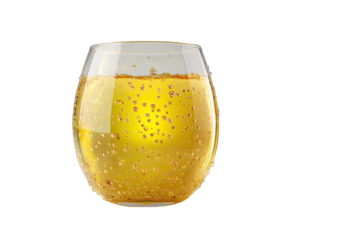 A clear glass filled with a golden liquid