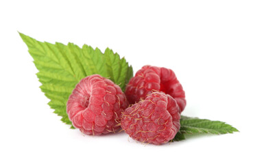 Fresh ripe raspberries and green leaves isolated on white