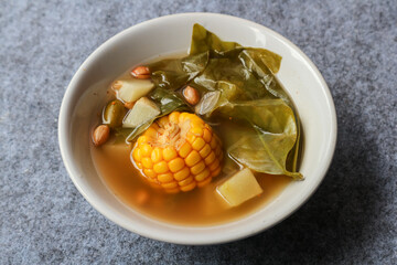 Sayur asam, sayur asem or tamarind soup is a popular traditional Indonesian soup. 