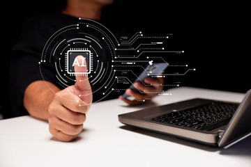 A person giving a thumbs-up gesture with a digital AI symbol, a smartphone, and a laptop, representing technology and innovation.