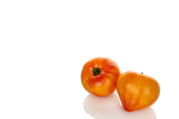 Juicy fresh tomatoes isolated on white background, close-up.