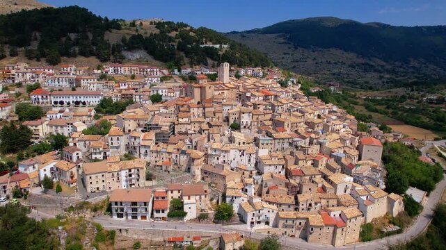 Abruzzo tourism, Italy . The most beautiful italian villages (borgo) Castel del Monte - Located in Gran Sasso mountain range. aerial drone 4k hd footage 

