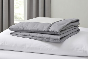 Modern Bedroom Interior with Folded Gray Comforter on White Pillow and Soft Gray Curtains in Background for Comfortable Sleep