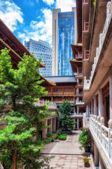 View of Chinese traditional building in the Jingan Temple, in the center of Shanghai, China