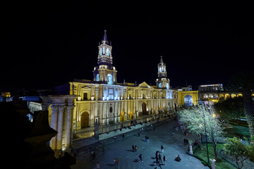 Majestic in white volcanic stone, the Cathedral of Arequipa rises proudly against the Andean sky. A...