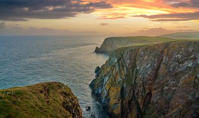 sunset on the Mull of Galloway, the southern most point of Scotland, UK