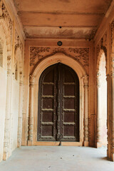 ancient Indian temple arches fragment,The sacred building carved from stone, Ancient rock curved temples of Hindu Gods at vrindavan
